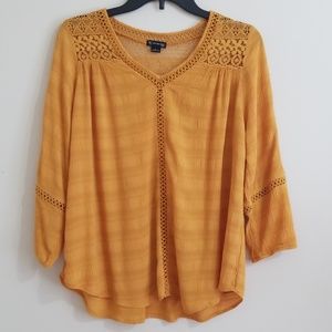 Mustard color flowy top.